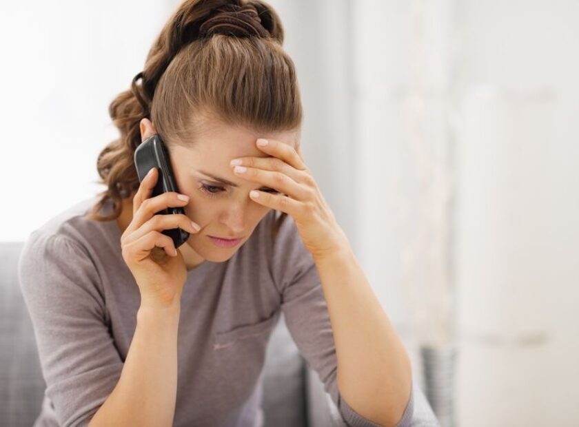 21359703 - stressed young woman talking cell phone